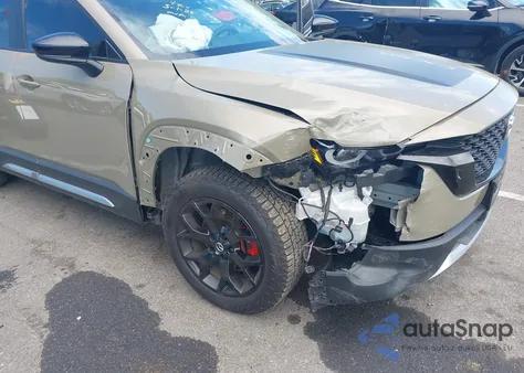 2023 Mazda Cx-50 2.5 Turbo Meridian Edition z USA, uszkodzony, nr VIN 7MMVABXYXPN130990